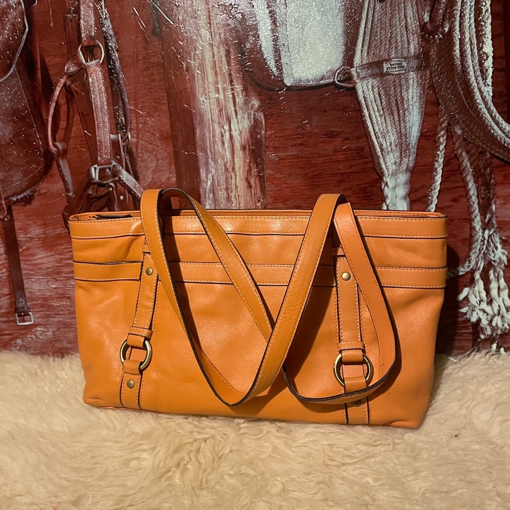 Wilson’s Leather orange leather bag